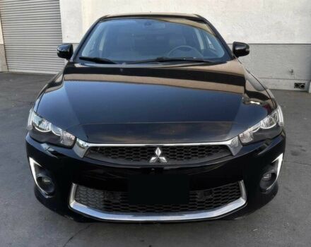 Черный Мицубиси Лансер, объемом двигателя 2.4 л и пробегом 76 тыс. км за 9200 $, фото 1 на Automoto.ua