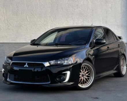 Черный Мицубиси Лансер, объемом двигателя 2.4 л и пробегом 76 тыс. км за 9200 $, фото 2 на Automoto.ua