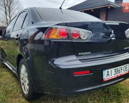 Чорний Міцубісі Lancer, об'ємом двигуна 2 л та пробігом 127 тис. км за 9600 $, фото 8 на Automoto.ua