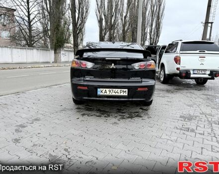 Черный Мицубиси Лансер, объемом двигателя 2.4 л и пробегом 118 тыс. км за 10200 $, фото 4 на Automoto.ua