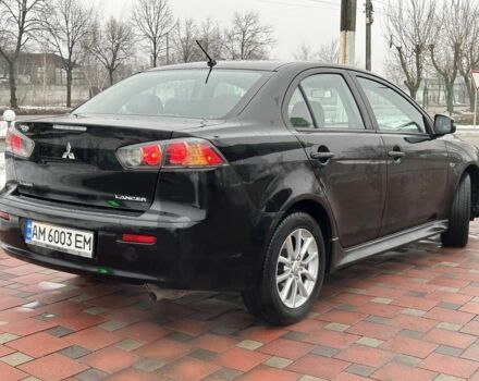 Чорний Міцубісі Lancer, об'ємом двигуна 2 л та пробігом 130 тис. км за 9500 $, фото 5 на Automoto.ua