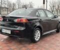 Чорний Міцубісі Lancer, об'ємом двигуна 2 л та пробігом 130 тис. км за 9500 $, фото 5 на Automoto.ua