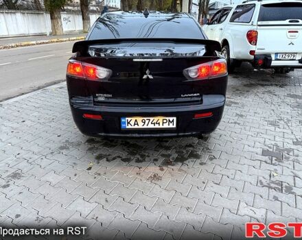 Черный Мицубиси Лансер, объемом двигателя 2.4 л и пробегом 118 тыс. км за 10200 $, фото 5 на Automoto.ua