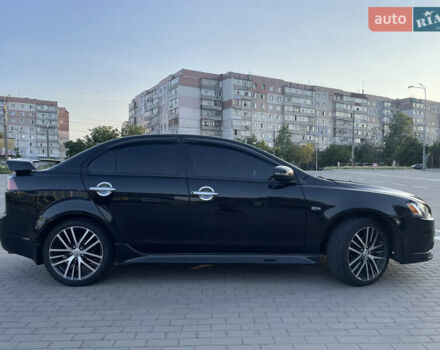 Черный Мицубиси Лансер, объемом двигателя 2.36 л и пробегом 136 тыс. км за 11600 $, фото 8 на Automoto.ua