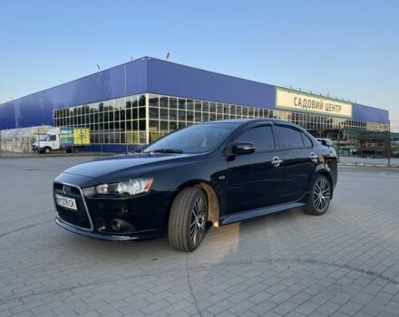 Черный Мицубиси Лансер, объемом двигателя 2.4 л и пробегом 140 тыс. км за 10800 $, фото 4 на Automoto.ua