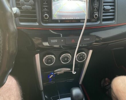 Черный Мицубиси Лансер, объемом двигателя 2.4 л и пробегом 140 тыс. км за 10800 $, фото 14 на Automoto.ua