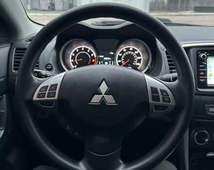 Черный Мицубиси Лансер, объемом двигателя 2 л и пробегом 142 тыс. км за 9500 $, фото 26 на Automoto.ua