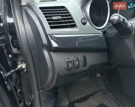 Черный Мицубиси Лансер, объемом двигателя 2 л и пробегом 142 тыс. км за 9500 $, фото 9 на Automoto.ua