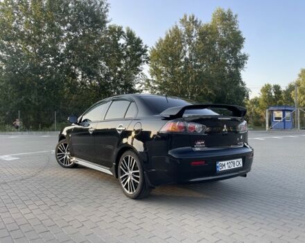 Черный Мицубиси Лансер, объемом двигателя 2.4 л и пробегом 140 тыс. км за 10800 $, фото 5 на Automoto.ua