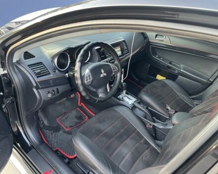 Черный Мицубиси Лансер, объемом двигателя 2.4 л и пробегом 140 тыс. км за 10800 $, фото 12 на Automoto.ua