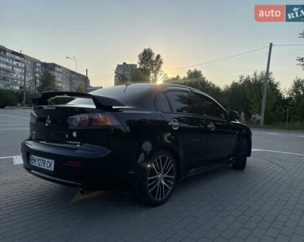 Черный Мицубиси Лансер, объемом двигателя 2.36 л и пробегом 136 тыс. км за 11600 $, фото 7 на Automoto.ua