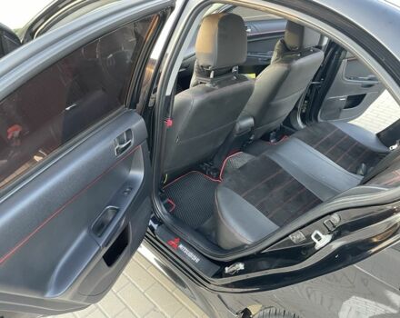 Черный Мицубиси Лансер, объемом двигателя 2.4 л и пробегом 140 тыс. км за 10800 $, фото 16 на Automoto.ua