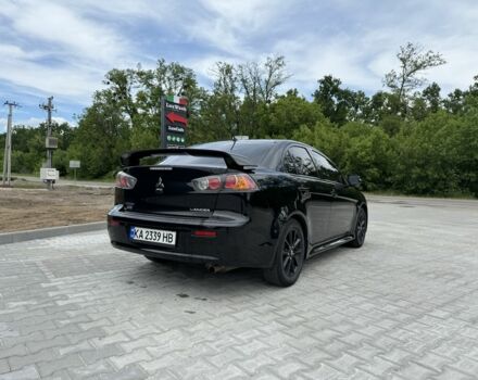 Чорний Міцубісі Lancer, об'ємом двигуна 2 л та пробігом 112 тис. км за 11300 $, фото 5 на Automoto.ua