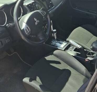 Черный Мицубиси Лансер, объемом двигателя 2.36 л и пробегом 134 тыс. км за 11200 $, фото 5 на Automoto.ua