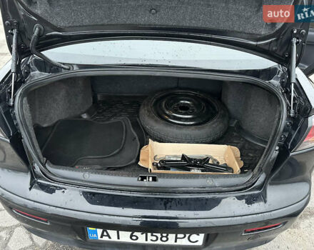 Черный Мицубиси Лансер, объемом двигателя 2 л и пробегом 142 тыс. км за 9500 $, фото 35 на Automoto.ua