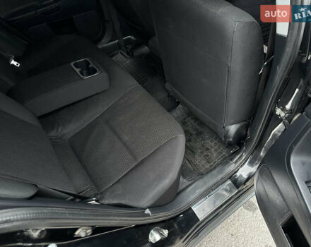 Черный Мицубиси Лансер, объемом двигателя 2 л и пробегом 142 тыс. км за 9500 $, фото 14 на Automoto.ua