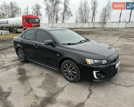 Черный Мицубиси Лансер, объемом двигателя 2 л и пробегом 142 тыс. км за 9500 $, фото 5 на Automoto.ua