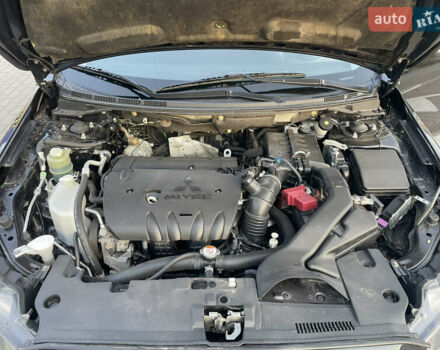 Черный Мицубиси Лансер, объемом двигателя 2.36 л и пробегом 136 тыс. км за 11600 $, фото 12 на Automoto.ua