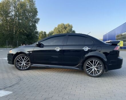 Черный Мицубиси Лансер, объемом двигателя 2.4 л и пробегом 140 тыс. км за 10800 $, фото 6 на Automoto.ua