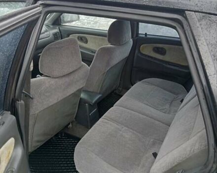 Чорний Міцубісі Lancer, об'ємом двигуна 2 л та пробігом 166 тис. км за 1699 $, фото 8 на Automoto.ua