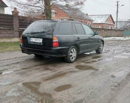 Чорний Міцубісі Lancer, об'ємом двигуна 2 л та пробігом 166 тис. км за 1699 $, фото 3 на Automoto.ua