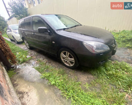 Чорний Міцубісі Lancer, об'ємом двигуна 2 л та пробігом 289 тис. км за 3600 $, фото 7 на Automoto.ua