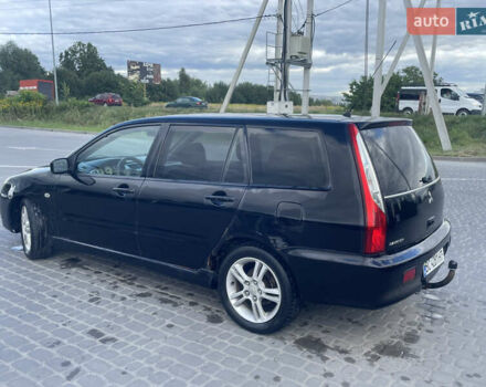 Чорний Міцубісі Lancer, об'ємом двигуна 2 л та пробігом 285 тис. км за 2550 $, фото 2 на Automoto.ua