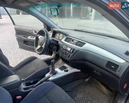 Чорний Міцубісі Lancer, об'ємом двигуна 2 л та пробігом 285 тис. км за 2550 $, фото 11 на Automoto.ua