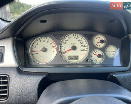 Чорний Міцубісі Lancer, об'ємом двигуна 2 л та пробігом 285 тис. км за 2550 $, фото 12 на Automoto.ua