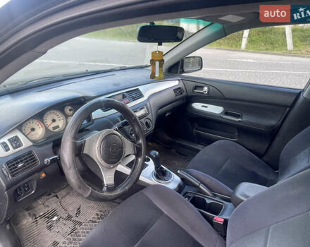 Чорний Міцубісі Lancer, об'ємом двигуна 2 л та пробігом 285 тис. км за 2550 $, фото 8 на Automoto.ua