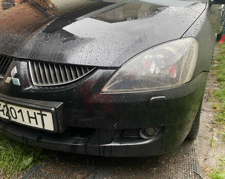 Чорний Міцубісі Lancer, об'ємом двигуна 2 л та пробігом 289 тис. км за 3600 $, фото 2 на Automoto.ua