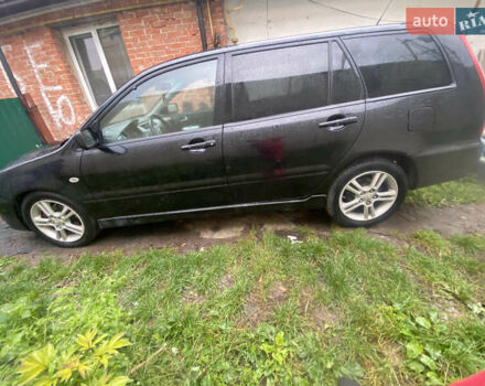 Чорний Міцубісі Lancer, об'ємом двигуна 2 л та пробігом 289 тис. км за 3600 $, фото 3 на Automoto.ua