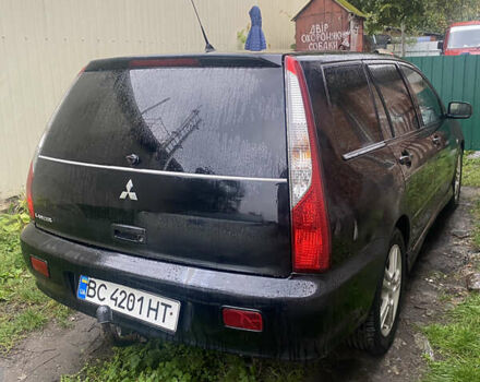 Чорний Міцубісі Lancer, об'ємом двигуна 2 л та пробігом 289 тис. км за 3600 $, фото 6 на Automoto.ua