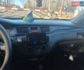 Черный Мицубиси Лансер, объемом двигателя 1.6 л и пробегом 591 тыс. км за 3300 $, фото 23 на Automoto.ua
