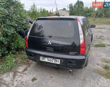 Чорний Міцубісі Lancer, об'ємом двигуна 2 л та пробігом 250 тис. км за 1850 $, фото 6 на Automoto.ua