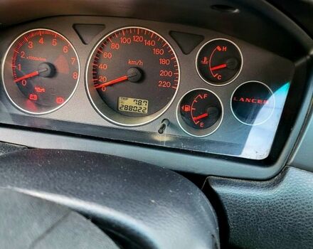 Чорний Міцубісі Lancer, об'ємом двигуна 1.6 л та пробігом 290 тис. км за 1999 $, фото 4 на Automoto.ua