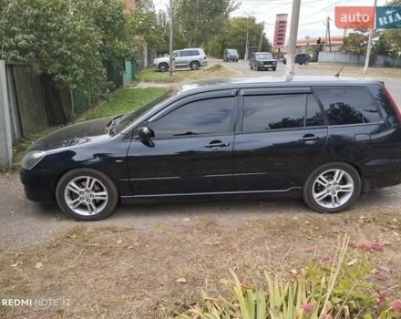 Міцубісі Lancer 2004 у Славянске на Automoto.ua Чорний Міцубісі Lancer, об'ємом двигуна 2 л та пробігом 231 тис. км за 5500 $, фото 2 на Automoto.ua