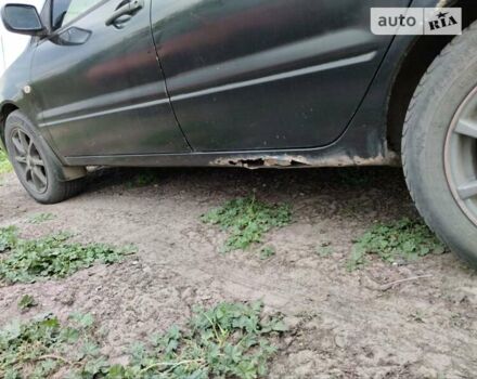 Чорний Міцубісі Lancer, об'ємом двигуна 1.6 л та пробігом 220 тис. км за 4100 $, фото 5 на Automoto.ua