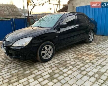Чорний Міцубісі Lancer, об'ємом двигуна 1.6 л та пробігом 121 тис. км за 3900 $, фото 1 на Automoto.ua