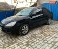 Чорний Міцубісі Lancer, об'ємом двигуна 1.6 л та пробігом 121 тис. км за 3900 $, фото 1 на Automoto.ua