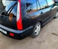 Чорний Міцубісі Lancer, об'ємом двигуна 1.6 л та пробігом 290 тис. км за 1999 $, фото 7 на Automoto.ua