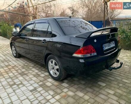 Чорний Міцубісі Lancer, об'ємом двигуна 1.6 л та пробігом 121 тис. км за 3900 $, фото 3 на Automoto.ua
