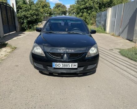 Черный Мицубиси Лансер, объемом двигателя 2 л и пробегом 175 тыс. км за 2850 $, фото 6 на Automoto.ua