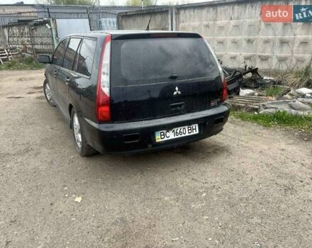 Чорний Міцубісі Lancer, об'ємом двигуна 2 л та пробігом 250 тис. км за 1850 $, фото 2 на Automoto.ua