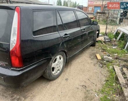 Чорний Міцубісі Lancer, об'ємом двигуна 2 л та пробігом 250 тис. км за 1850 $, фото 3 на Automoto.ua