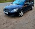 Чорний Міцубісі Lancer, об'ємом двигуна 1.6 л та пробігом 290 тис. км за 1999 $, фото 10 на Automoto.ua