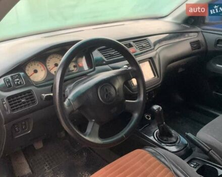 Чорний Міцубісі Lancer, об'ємом двигуна 1.6 л та пробігом 121 тис. км за 3900 $, фото 6 на Automoto.ua