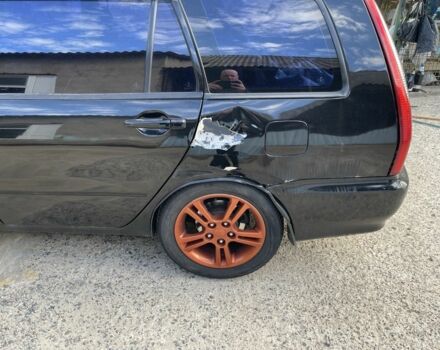 Черный Мицубиси Лансер, объемом двигателя 2 л и пробегом 175 тыс. км за 2850 $, фото 8 на Automoto.ua