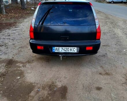 Чорний Міцубісі Lancer, об'ємом двигуна 1.6 л та пробігом 290 тис. км за 1999 $, фото 8 на Automoto.ua