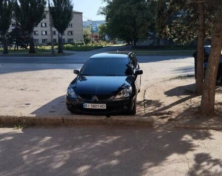 Міцубісі Lancer 2004 у Славянске на Automoto.ua Чорний Міцубісі Lancer, об'ємом двигуна 2 л та пробігом 231 тис. км за 5500 $, фото 3 на Automoto.ua